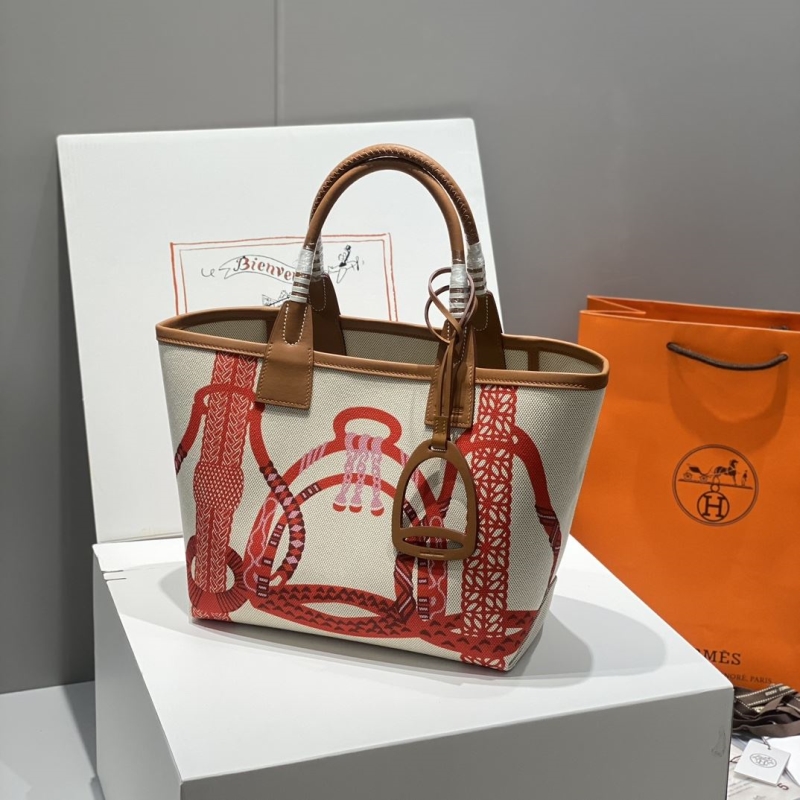 H**mes shopping bags